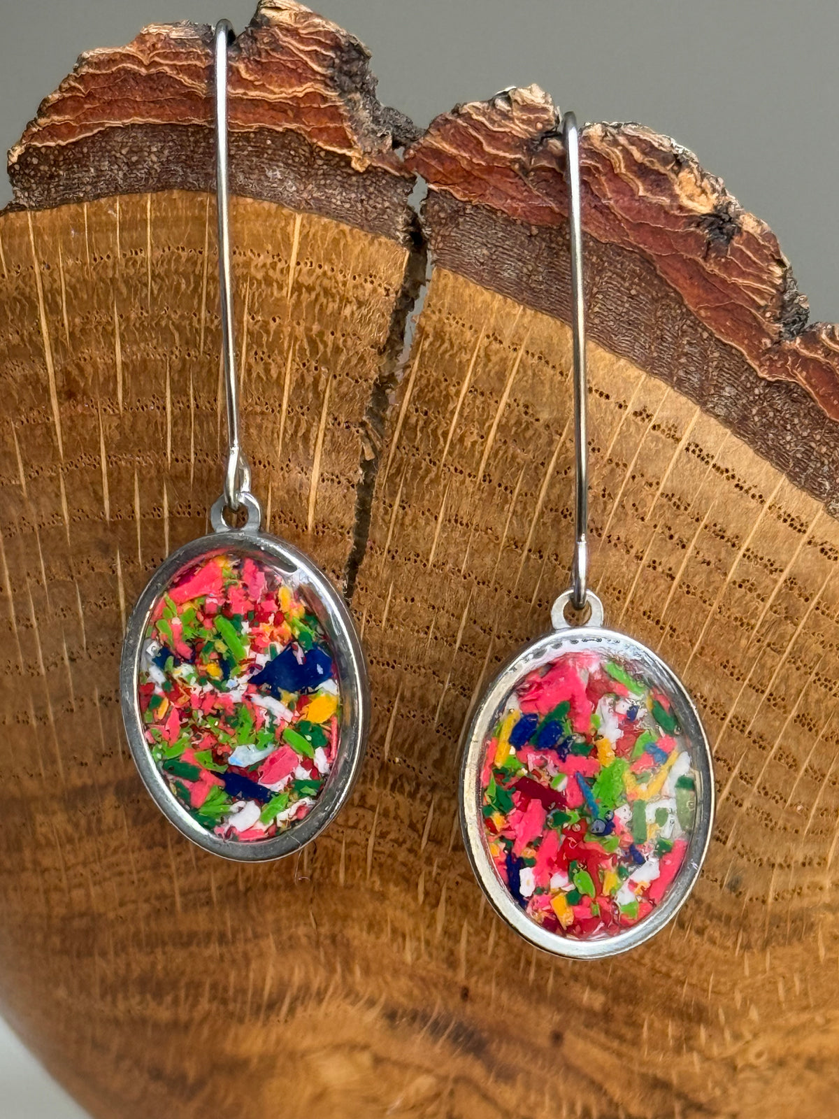 handcrafted crayon shavings oval earrings. Crayon jewelry by mother-daughter based in Atlanta, GA. crayoon jewelry by crayonfetti