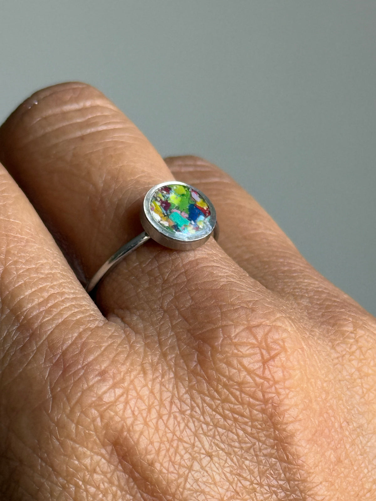 Handcrafted ring made with recycled crayons, featuring a polished and sophisticated silhouette. Made by mother-daughter studio in Atlanta, GA. It's crayon jewelry.