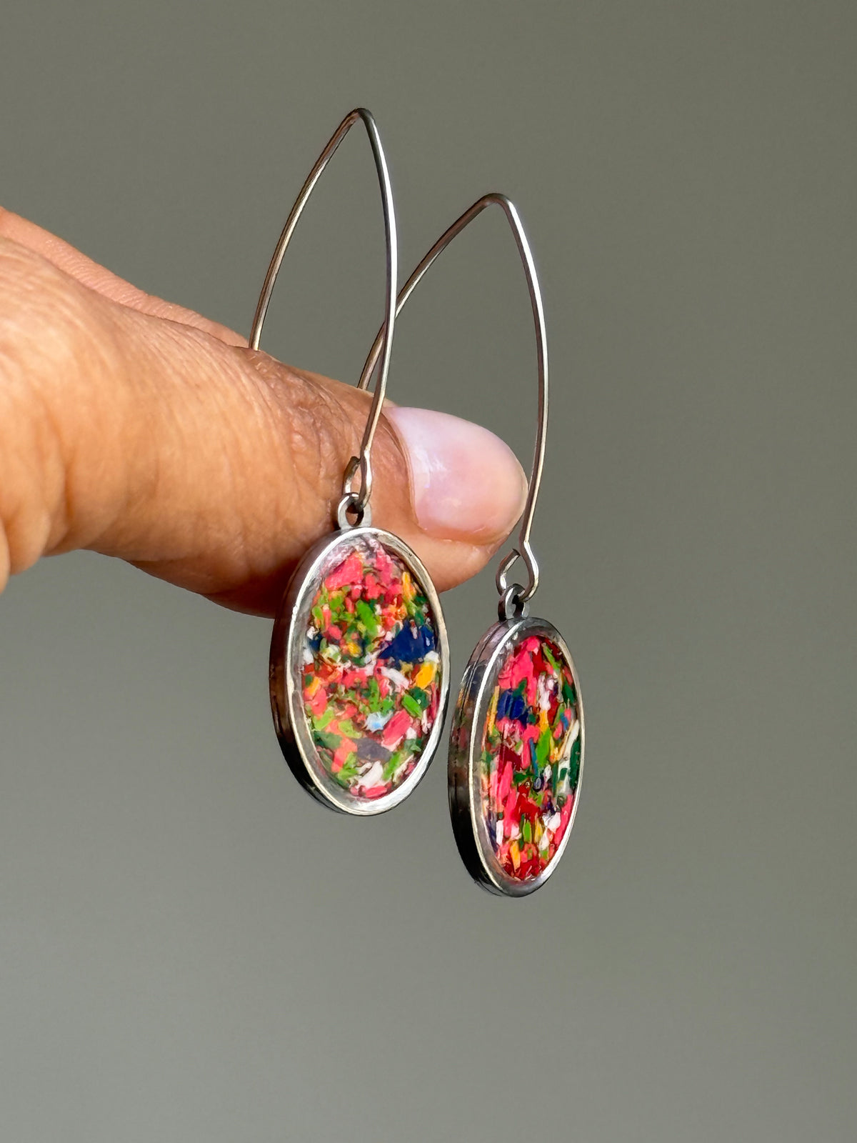 handcrafted crayon shavings oval earrings. Crayon jewelry by mother-daughter based in Atlanta, GA. crayoon jewelry by crayonfetti