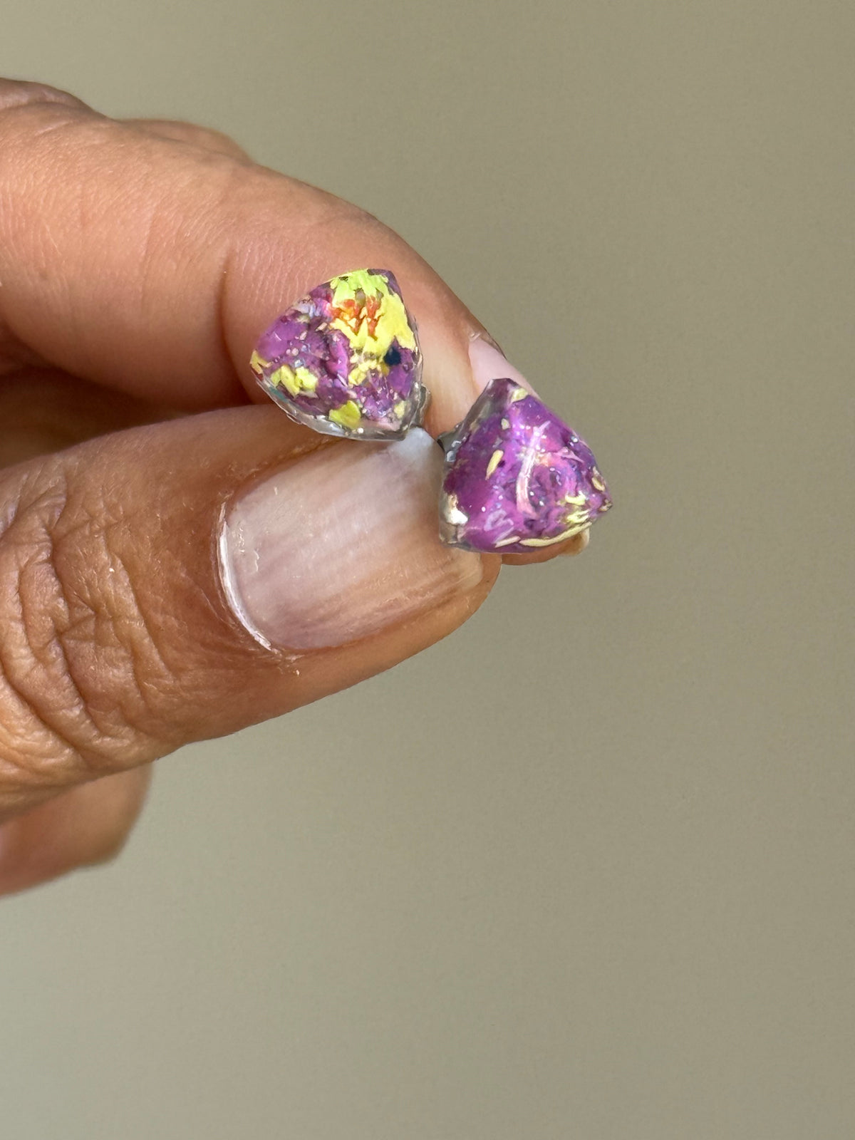 small colorful studs made with recycled crayons. Our crayon jewelry are a joyful pop-of-color made from our mother-daughter studio in Atlanta, GA.