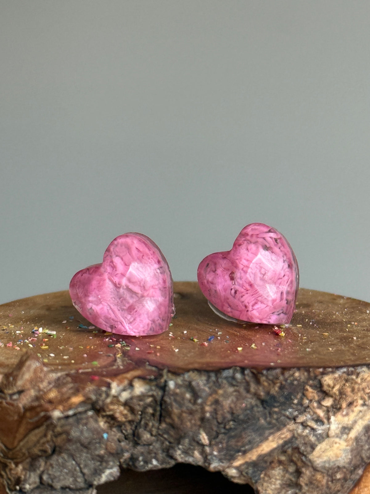 thistle crayon, small colorful studs made with recycled crayons. Our crayon jewelry are a joyful pop-of-color made from our mother-daughter studio in Atlanta, GA.