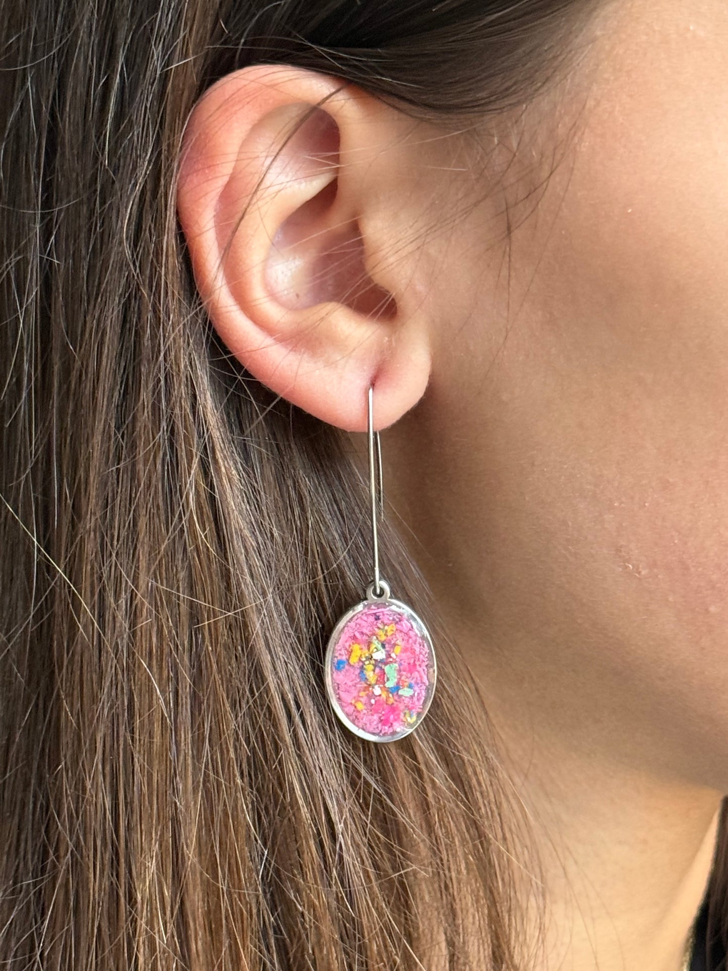 Our Prisma earrings are handcrafted with recycled crayons. Lightweight and colorful statement earrings. A vibrant and joyful sustainable jewelry statement from our mother-daughter studio in Atlanta, GA.