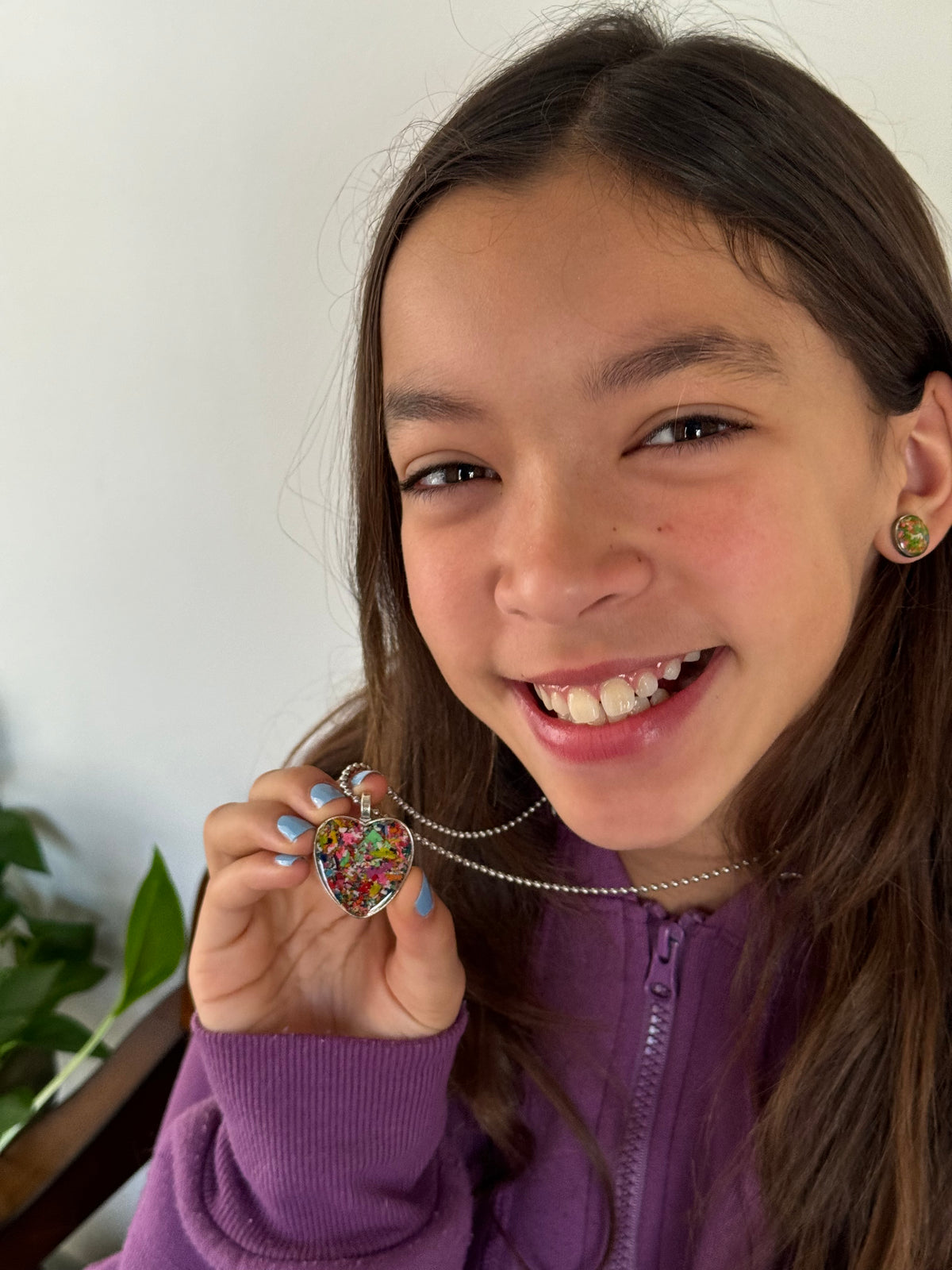 Large multicolor Viva crayon filled heart shaped stainless steel pendant. Crayon jewelry by Crayonfetti, mother-daughter based in Atlanta.