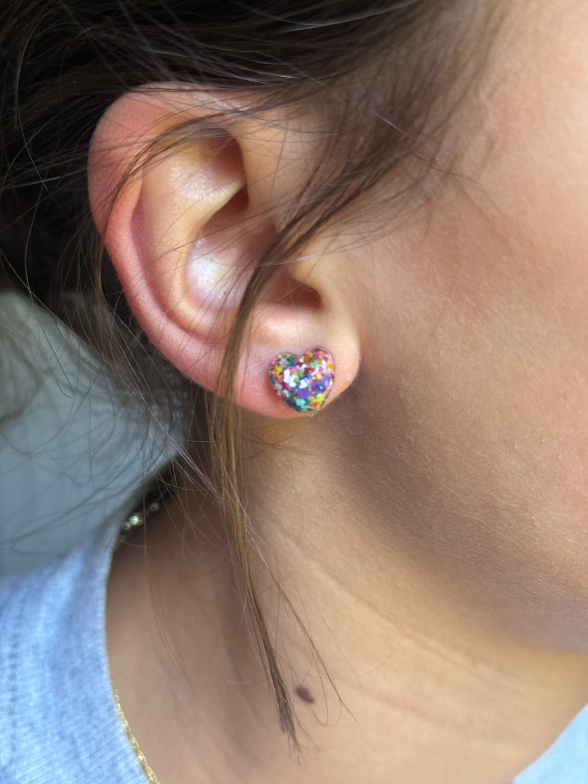 small colorful studs made with recycled crayons. Our crayon jewelry are a joyful pop-of-color made from our mother-daughter studio in Atlanta, GA.