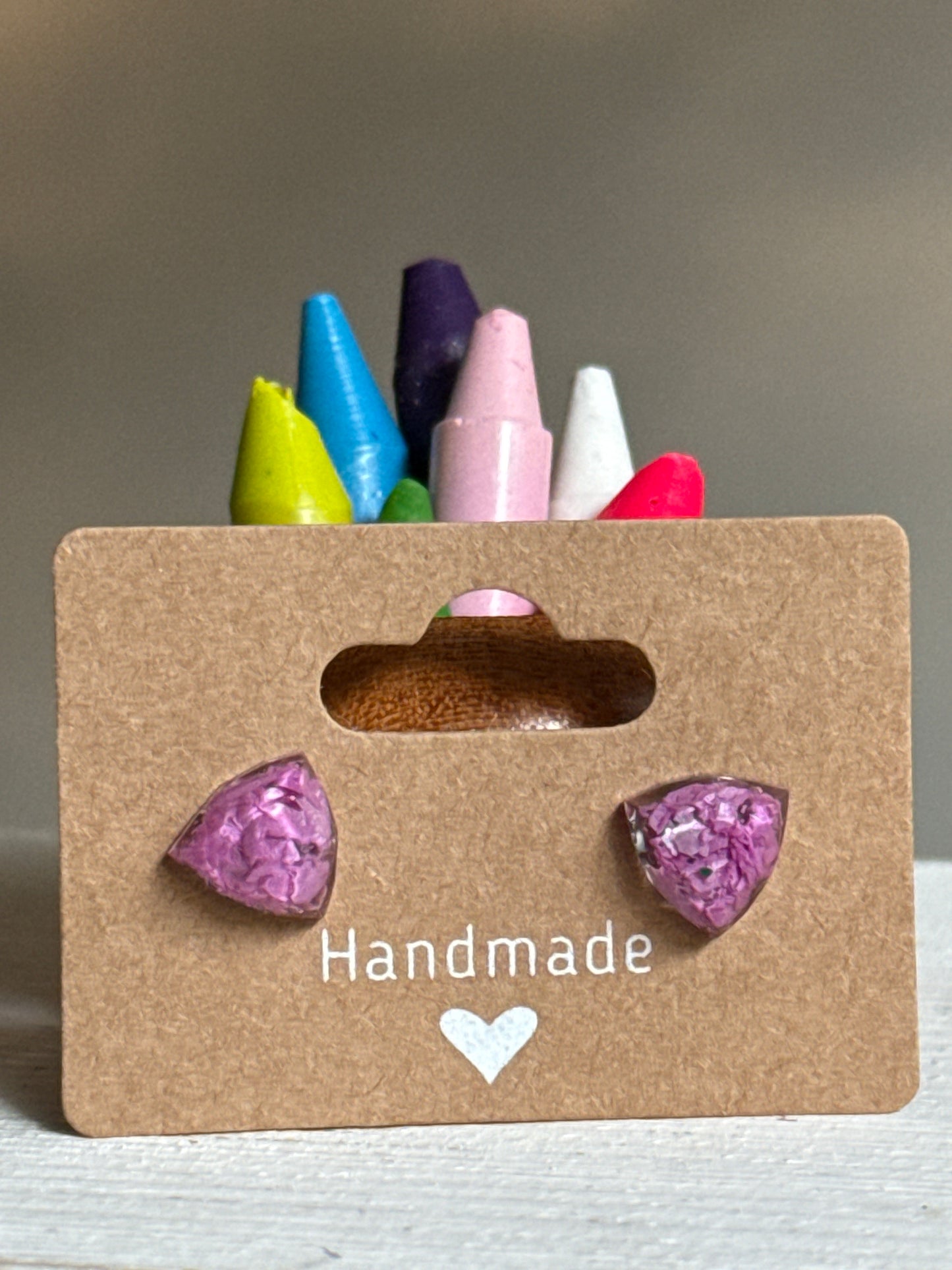 purple triangle stainless steel studs filled with crayon shavings. Crayonfetti crayon jewelry by mother-daughter based in Atlanta, Georgia.