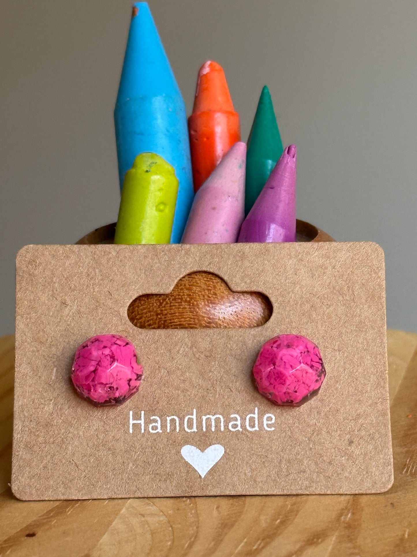 small colorful studs made with recycled crayons. Our crayon jewelry are a joyful pop-of-color made from our mother-daughter studio in Atlanta, GA.