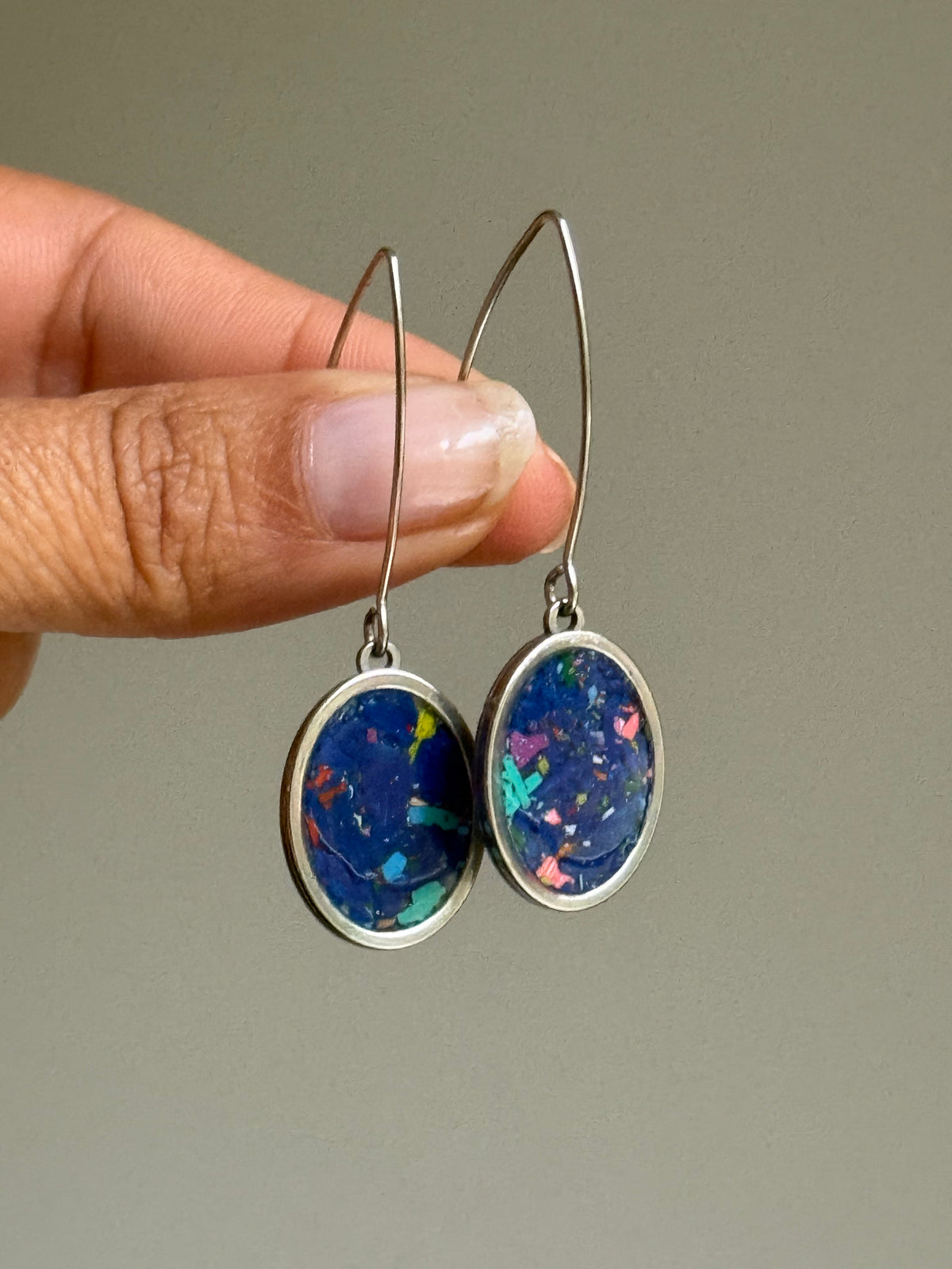 Our Prisma earrings are handcrafted with recycled crayons. Lightweight and colorful statement earrings. A vibrant and joyful sustainable jewelry statement from our mother-daughter studio in Atlanta, GA.