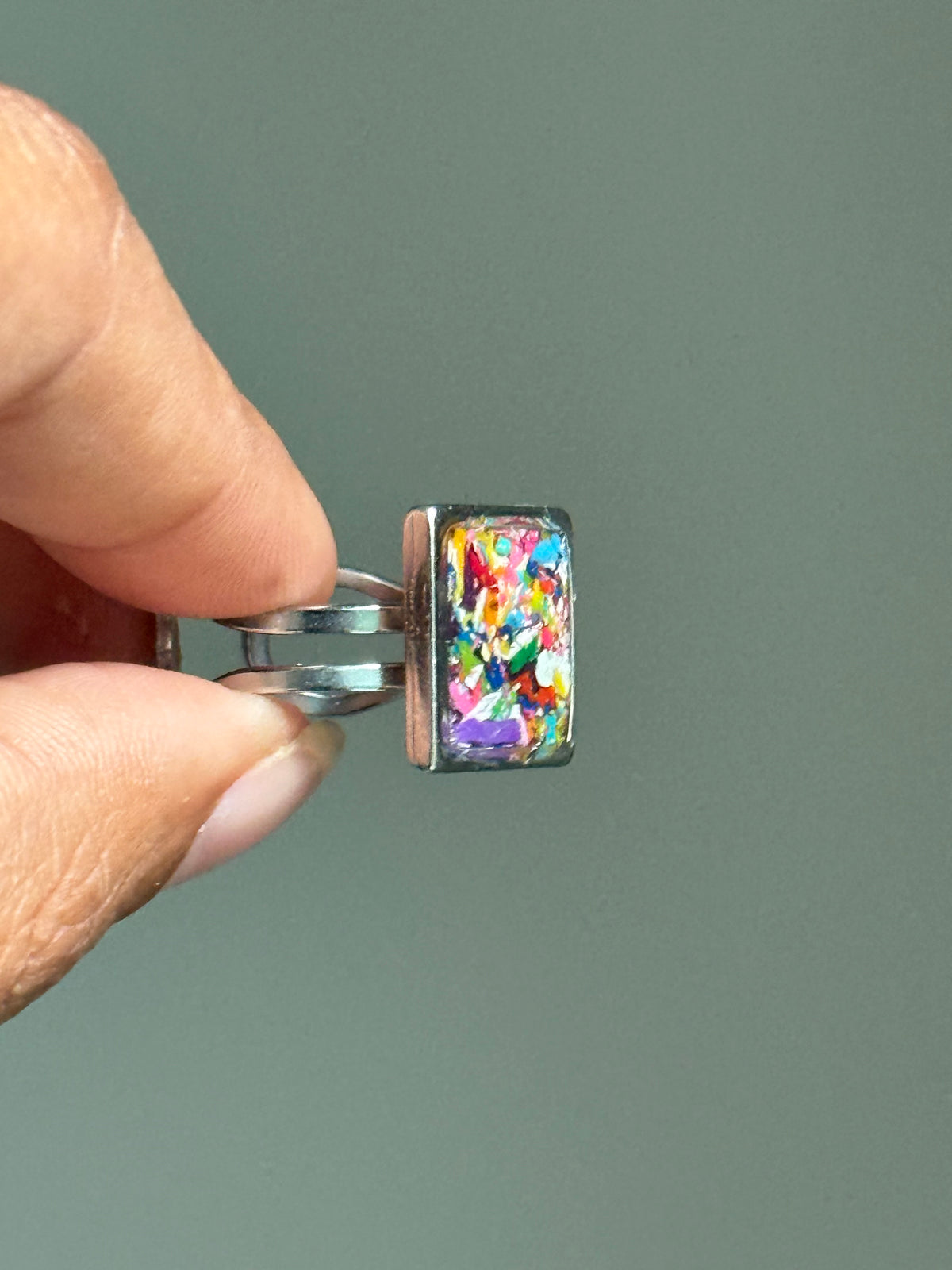 Handcrafted ring made with recycled crayons, featuring a polished and sophisticated silhouette. Made by mother-daughter studio in Atlanta, GA. It's crayon jewelry.