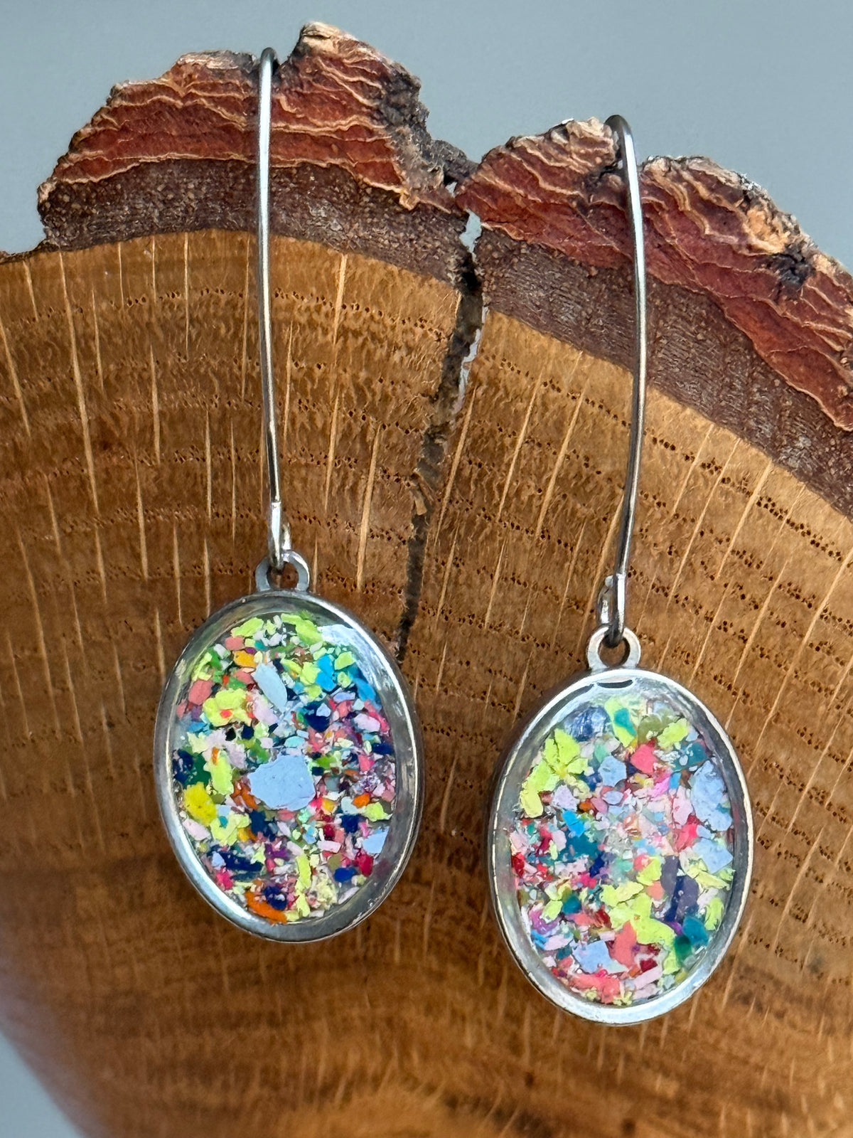 Our Prisma earrings are handcrafted with recycled crayons. Lightweight and colorful statement earrings. A vibrant and joyful sustainable jewelry statement from our mother-daughter studio in Atlanta, GA.