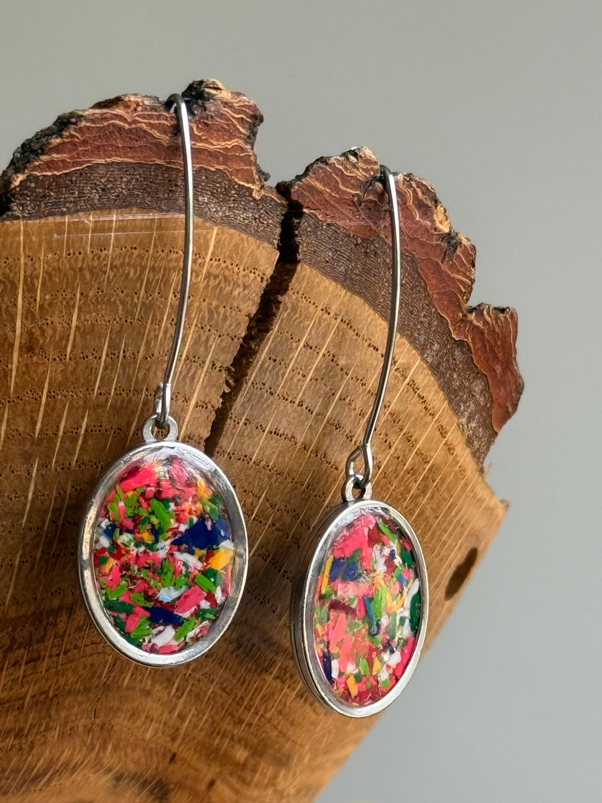 handcrafted crayon shavings oval earrings. Crayon jewelry by mother-daughter based in Atlanta, GA. crayoon jewelry by crayonfetti