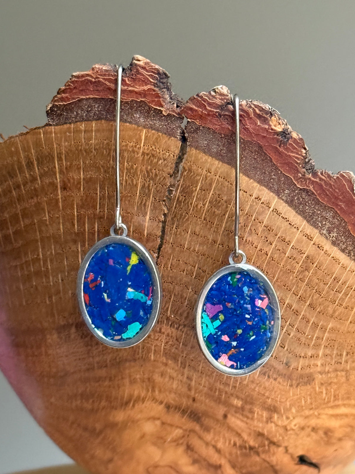 Our Prisma earrings are handcrafted with recycled crayons. Lightweight and colorful statement earrings. A vibrant and joyful sustainable jewelry statement from our mother-daughter studio in Atlanta, GA.