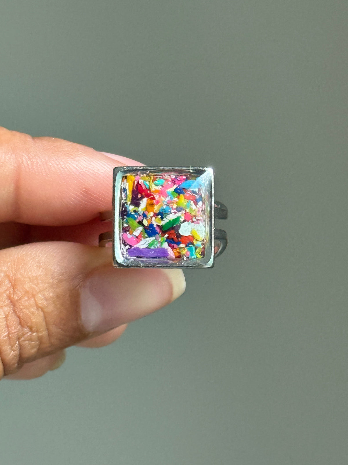Handcrafted ring made with recycled crayons, featuring a polished and sophisticated silhouette. Made by mother-daughter studio in Atlanta, GA. It's crayon jewelry.
