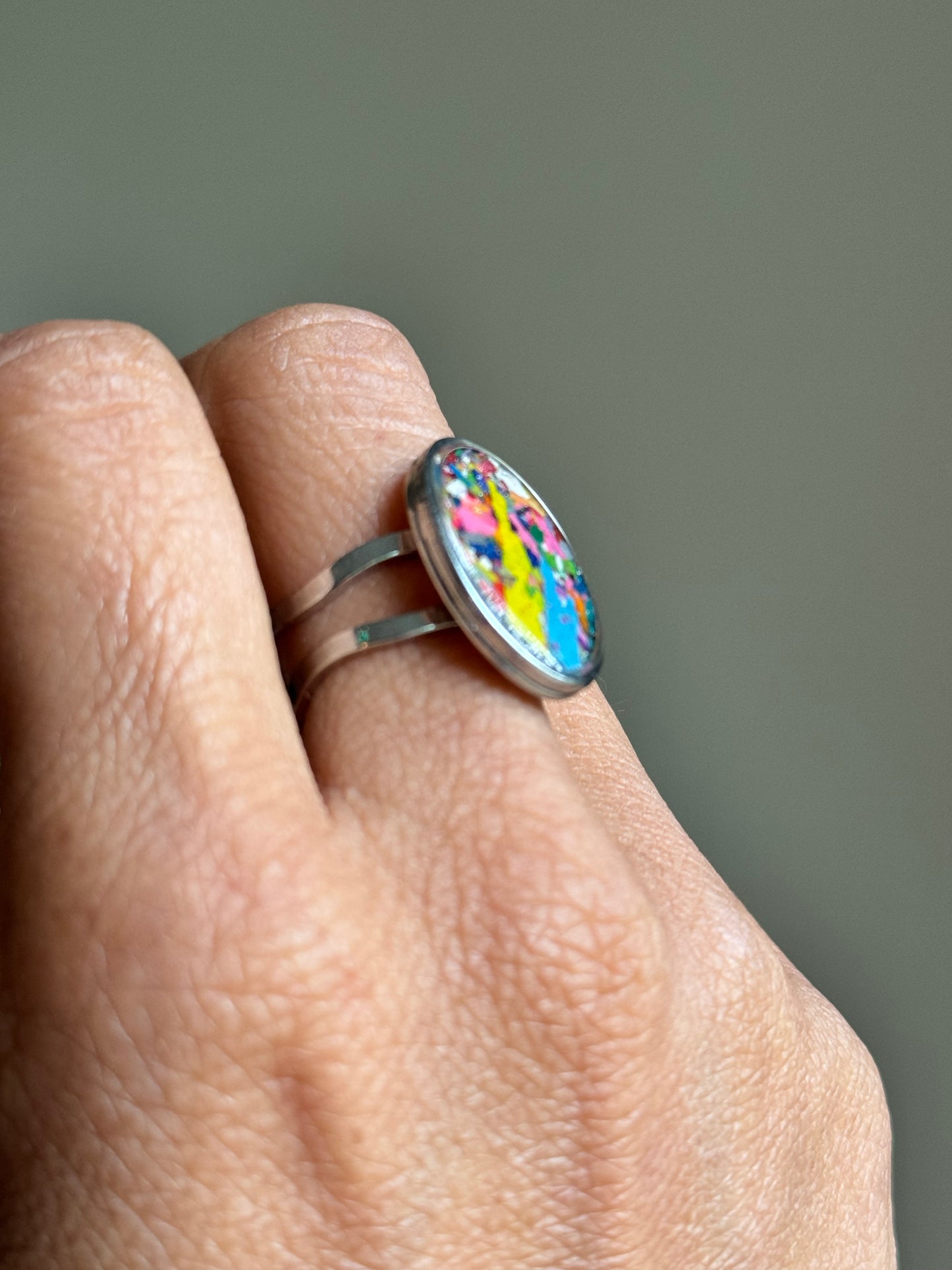Handcrafted ring made with recycled crayons, featuring a polished and sophisticated silhouette. Made by mother-daughter studio in Atlanta, GA. It's crayon jewelry.