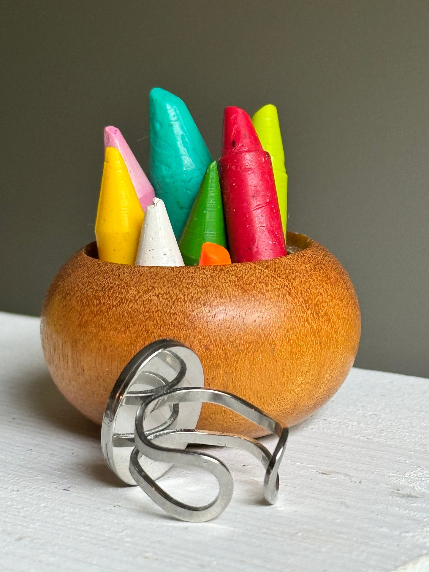 Handcrafted ring made with recycled crayons, featuring a polished and sophisticated silhouette. Made by mother-daughter studio in Atlanta, GA. It's crayon jewelry.