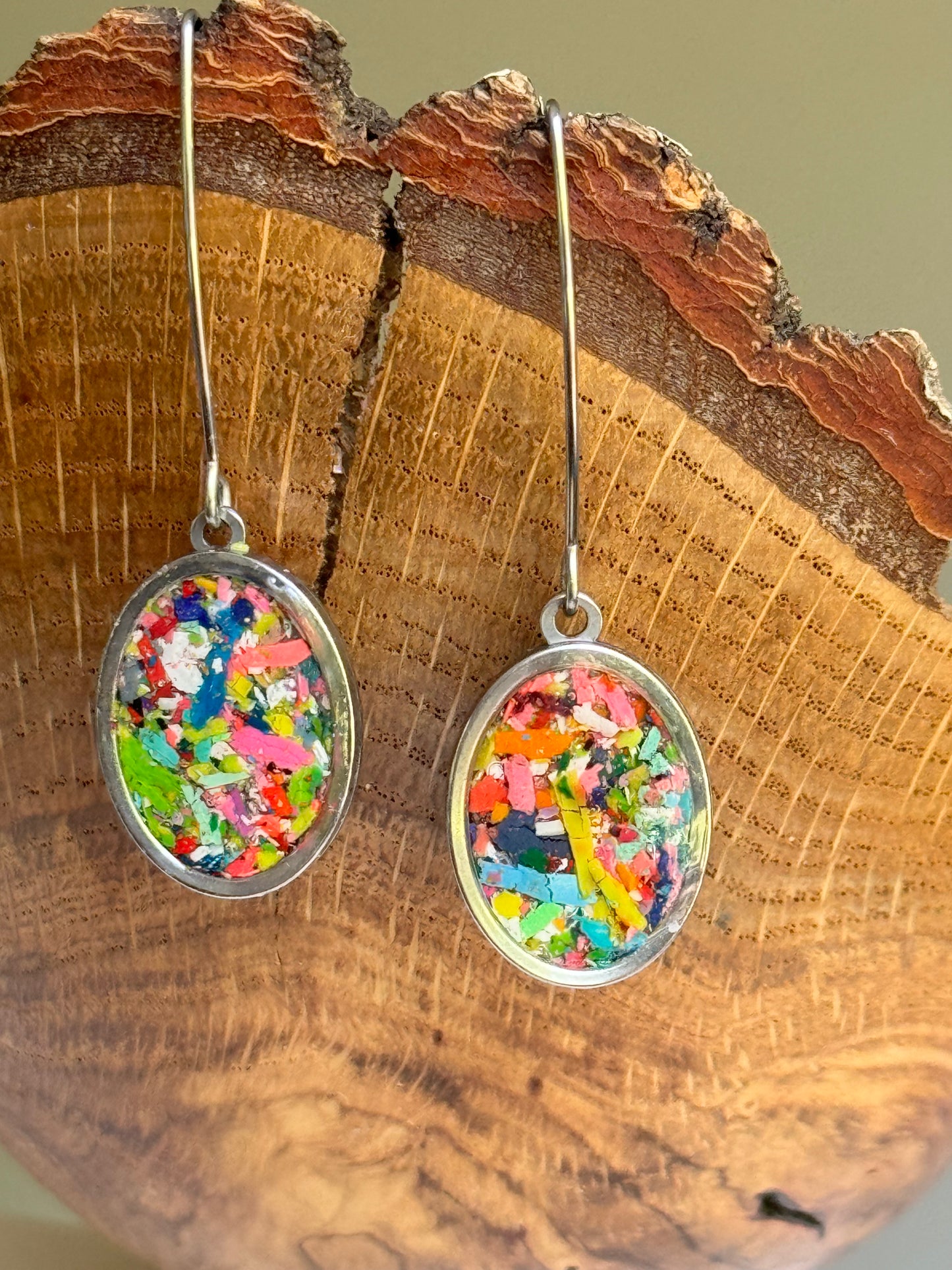 Our Prisma earrings are handcrafted with recycled crayons. Lightweight and colorful statement earrings. A vibrant and joyful sustainable jewelry statement from our mother-daughter studio in Atlanta, GA.