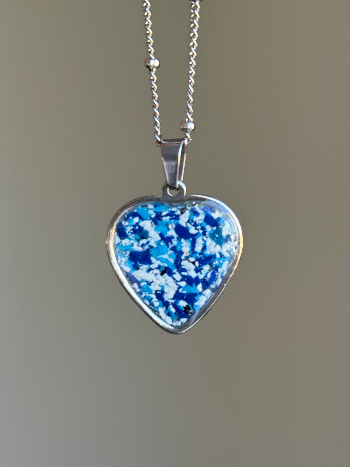 Blue white crayon shavings heart necklace colorful upcycled jewelry. Crayon jewelry by Crayonfetti, mother-daughter based in Atlanta.