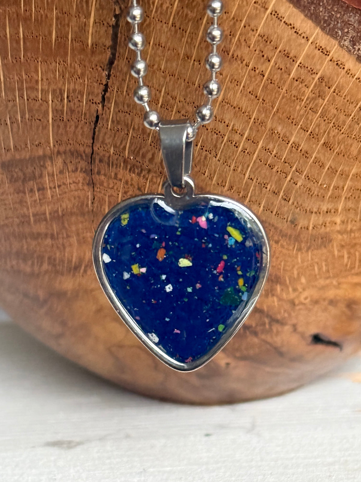 navy blue crayon filled heart shaped stainless steel pendant. crayon jewelry by crayonfetti