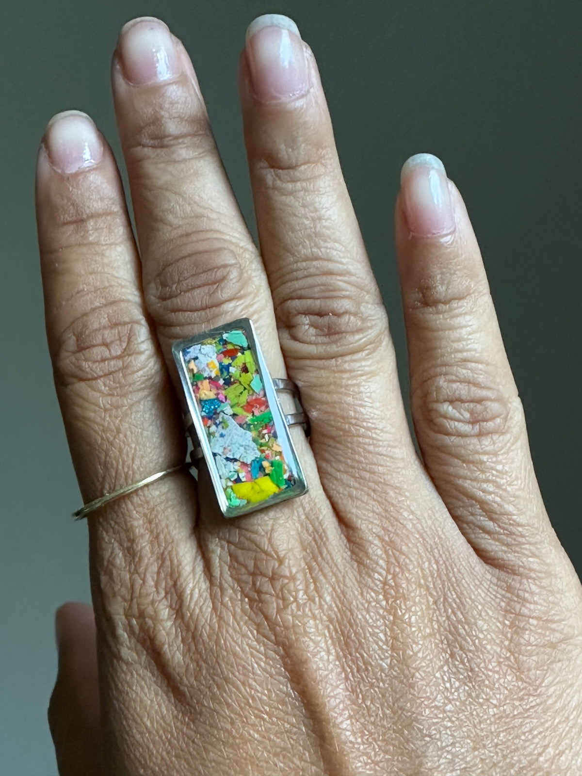Handcrafted ring made with recycled crayons, featuring a polished and sophisticated silhouette. Made by mother-daughter studio in Atlanta, GA. It's crayon jewelry.