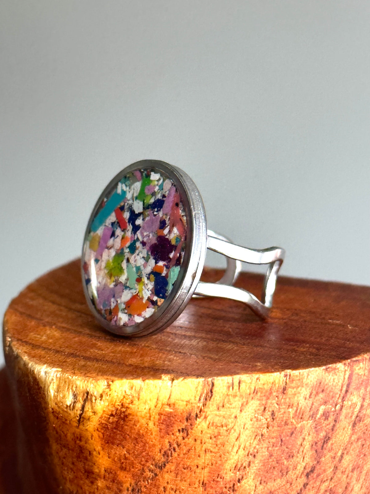 Handcrafted ring made with recycled crayons, featuring a polished and sophisticated silhouette. Made by mother-daughter studio in Atlanta, GA. It's crayon jewelry.
