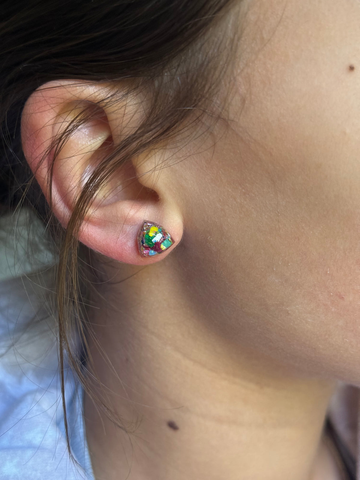 small colorful studs made with recycled crayons. Our crayon jewelry are a joyful pop-of-color made from our mother-daughter studio in Atlanta, GA.