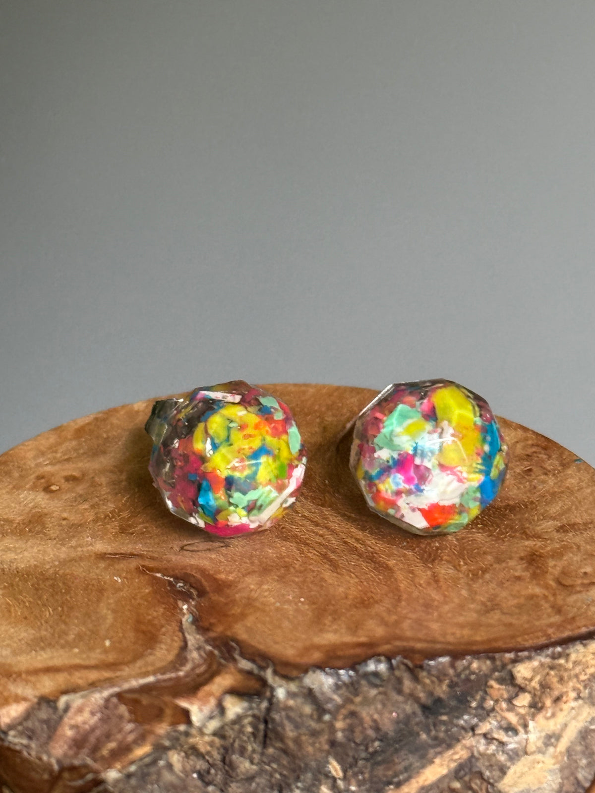multicolor round studs filled with crayons