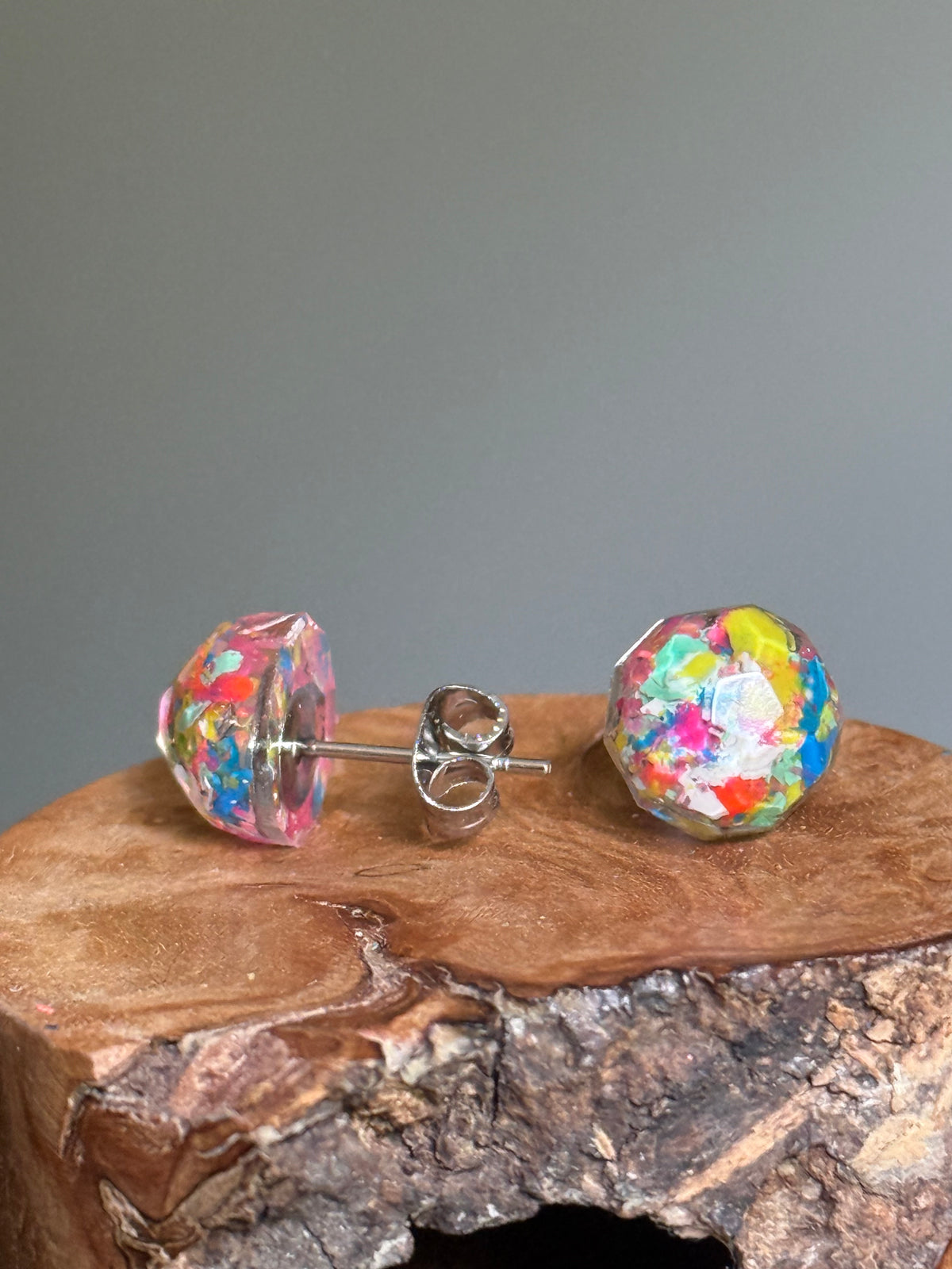colorful round studs filled with crayons