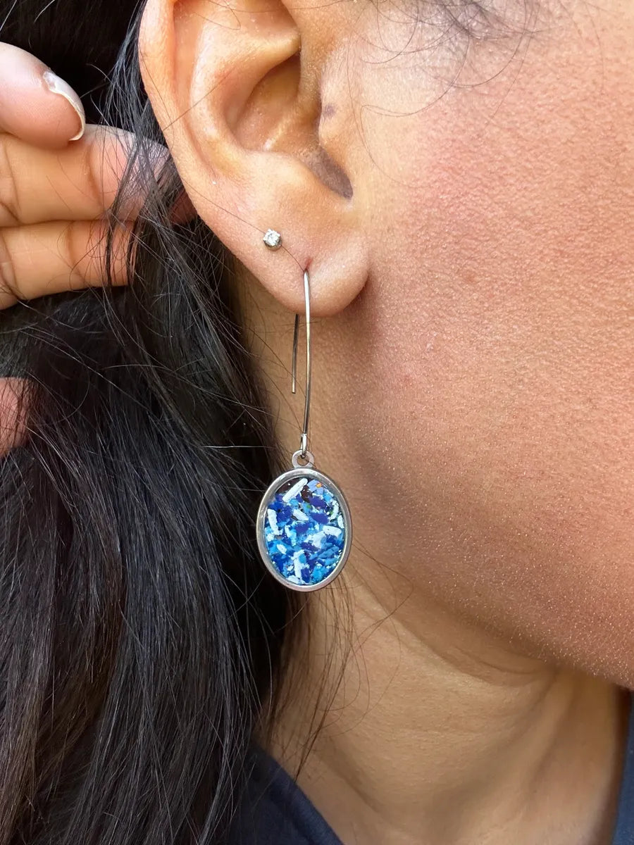 Stainless steel round pendant filled with crayon shavings by crayonfetti. Crayon jewelry. Crayon gifts. Teacher gift idea. Crayonpendants. Crayon pendants.