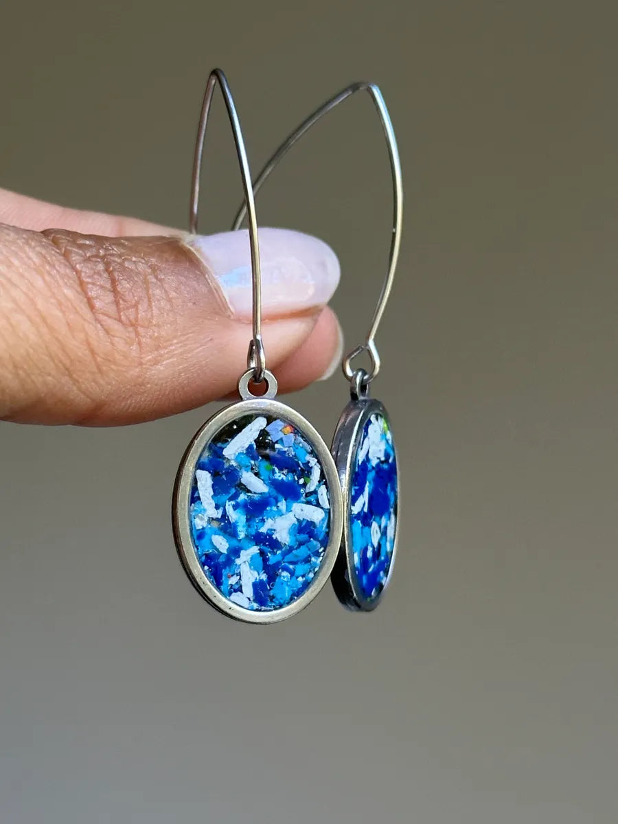 Stainless steel round pendant filled with crayon shavings by crayonfetti. Crayon jewelry. Crayon gifts. Teacher gift idea. Crayonpendants. Crayon pendants.