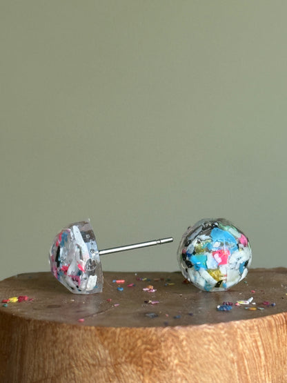 Round studs filled with crayon shavings.  Includes surgical-grade stainless steel posts. Crayonfeti crayon jewelry by mother daughter based in Atlanta. 