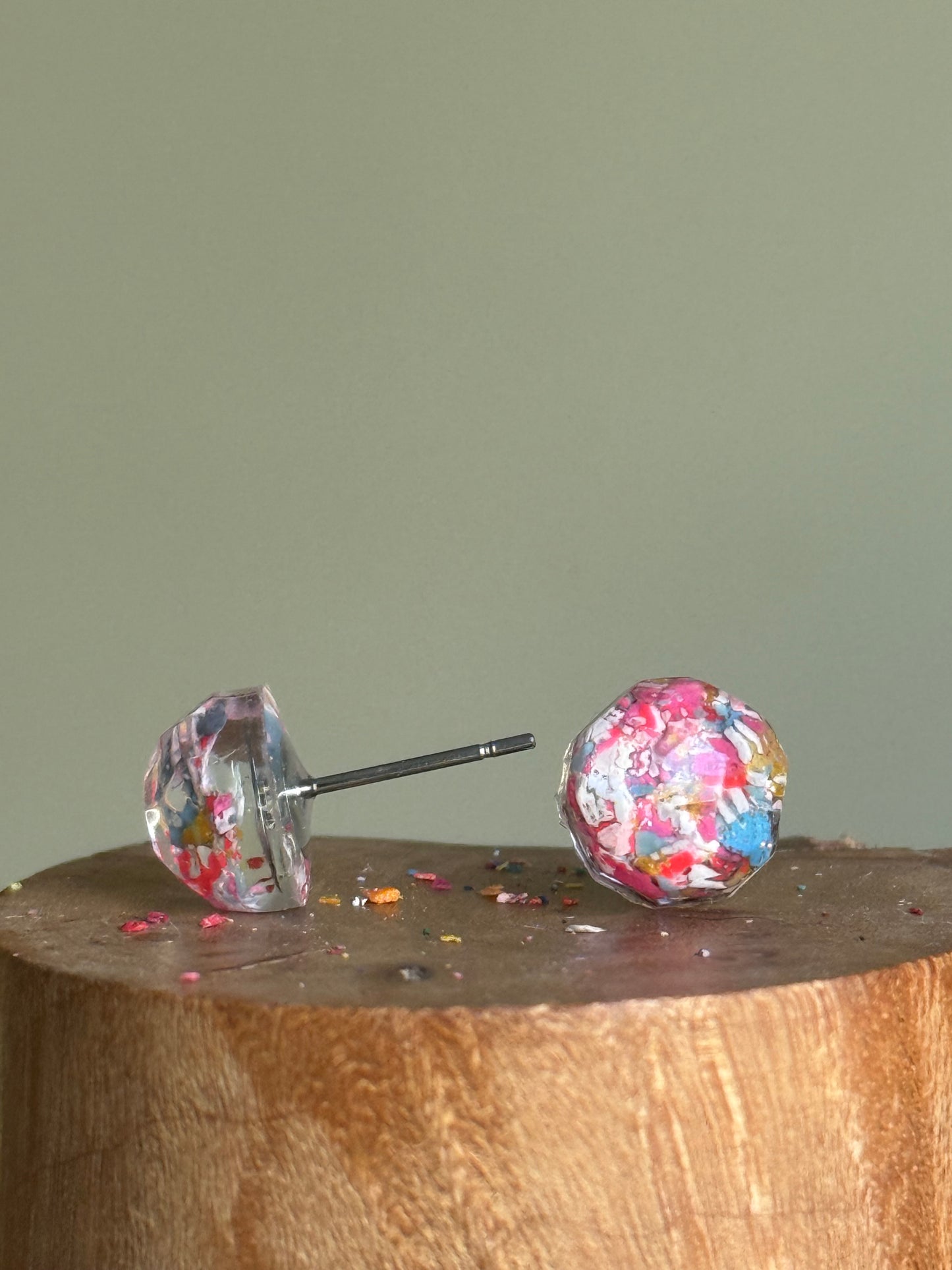 small colorful studs made with recycled crayons. Our crayon jewelry are a joyful pop-of-color made from our mother-daughter studio in Atlanta, GA.