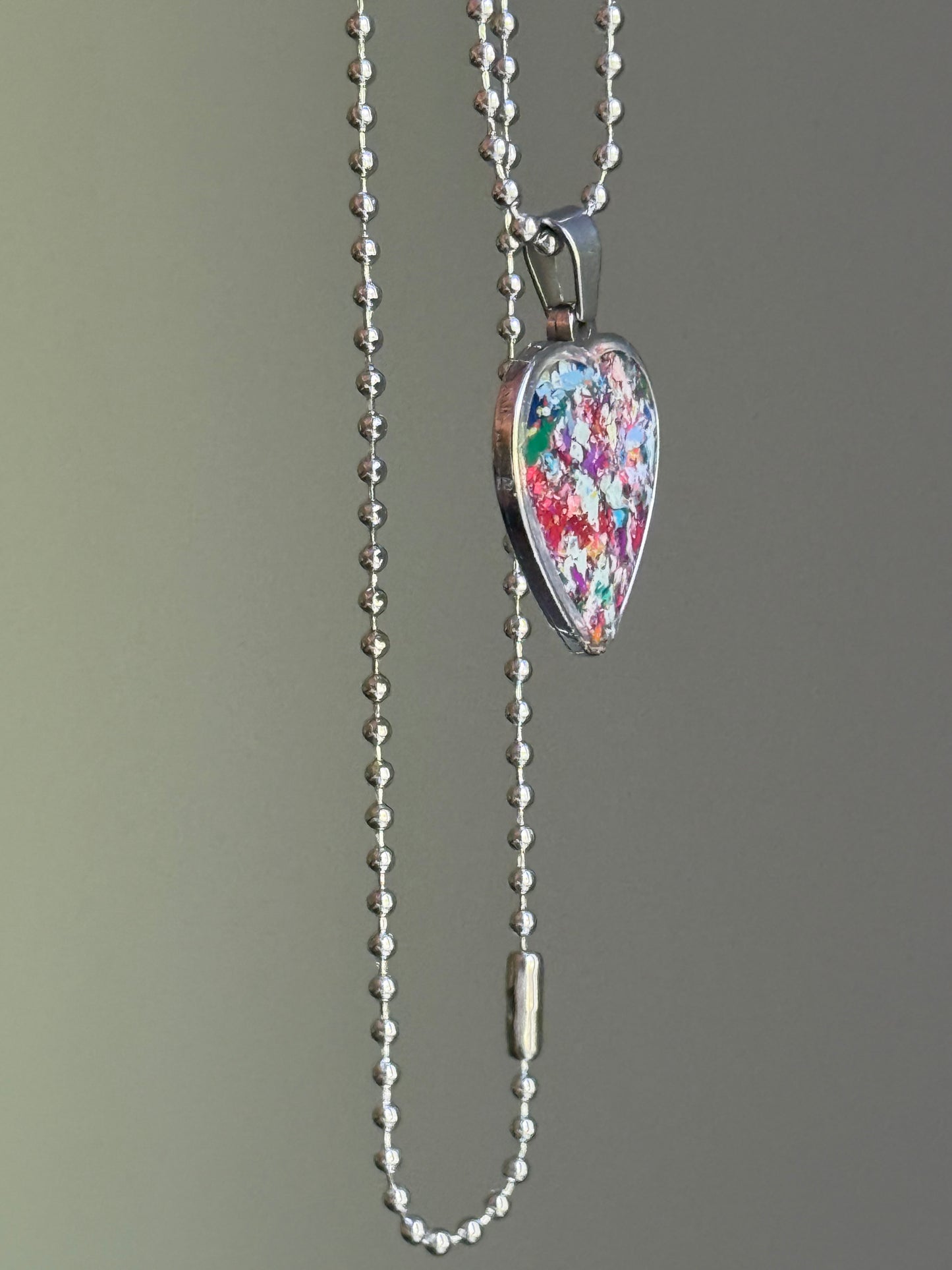 Handmade in Atlanta by a mother-daughter team. Find an original, hypoallergenic heart-shaped pendant from crayon jewelry by Crayonfetti. 