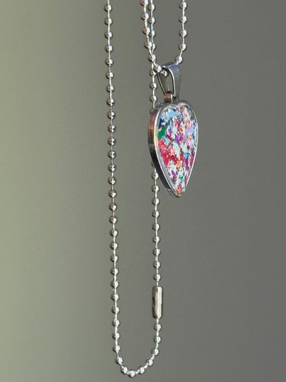 Handmade in Atlanta by a mother-daughter team. Find an original, hypoallergenic heart-shaped pendant from crayon jewelry by Crayonfetti. 