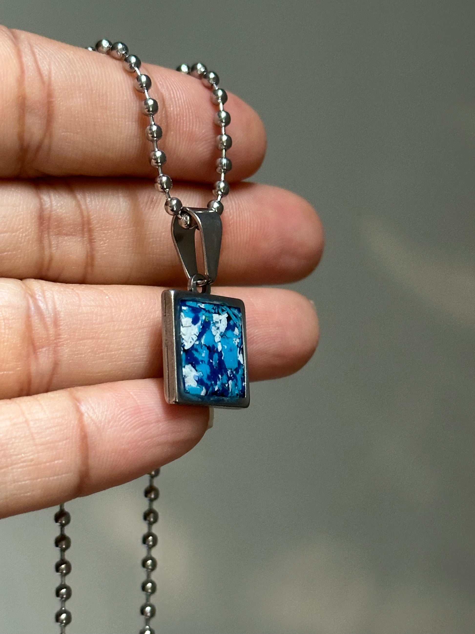 Stainless steel square pendant filled with crayon shavings by crayonfetti. Crayon jewelry.  Crayon gifts. Teacher gift idea.  Crayonpendants.  Crayon pendants.