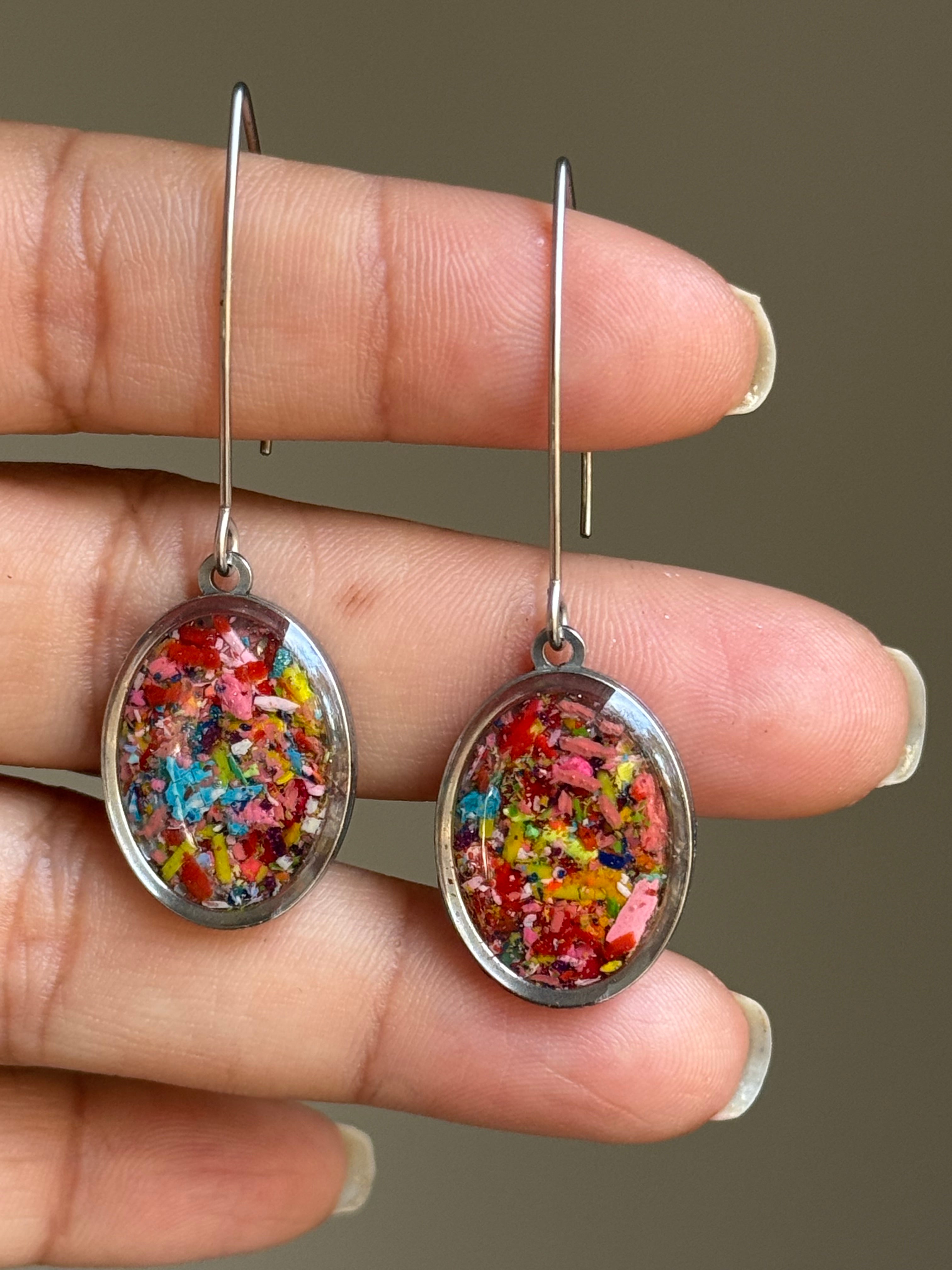 Lightweight oval dangling earrings in aurora colors handcrafted with crayon shavings. Crayonfetti crayon jewelry by mother-daughter based in Atlanta, GA.