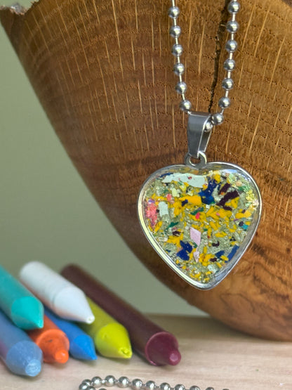 multicolor swirl crayon shavings heart necklace handmade jewelry. Crayon jewelry by Crayonfetti, mother-daughter based in Atlanta