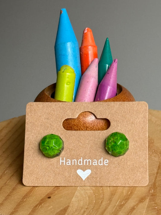 green Round studs filled with crayon shavings.  Includes surgical-grade stainless steel posts. Crayonfeti crayon jewelry by mother daughter based in Atlanta. 

