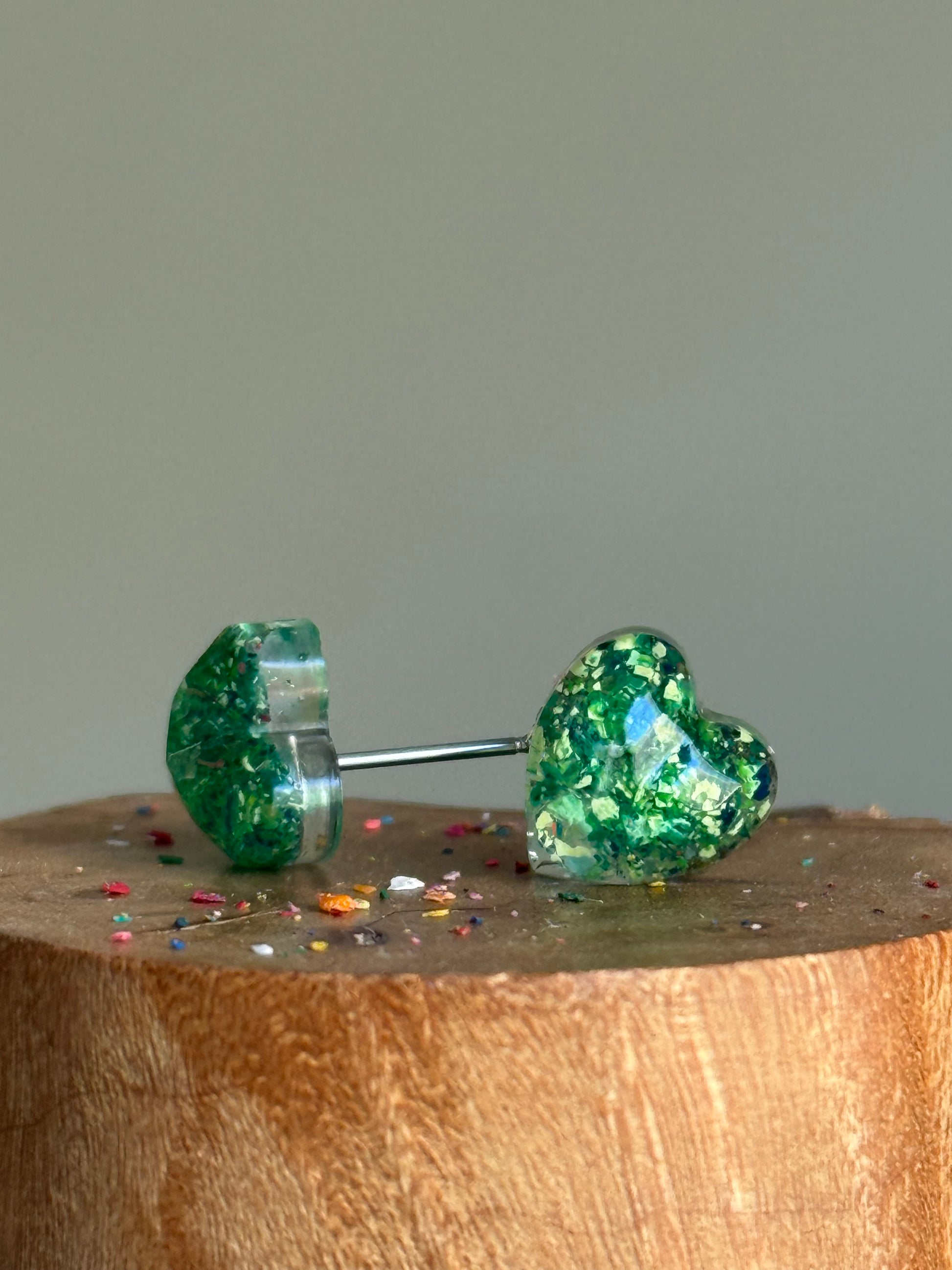 small colorful studs made with recycled crayons. Our crayon jewelry are a joyful pop-of-color made from our mother-daughter studio in Atlanta, GA.