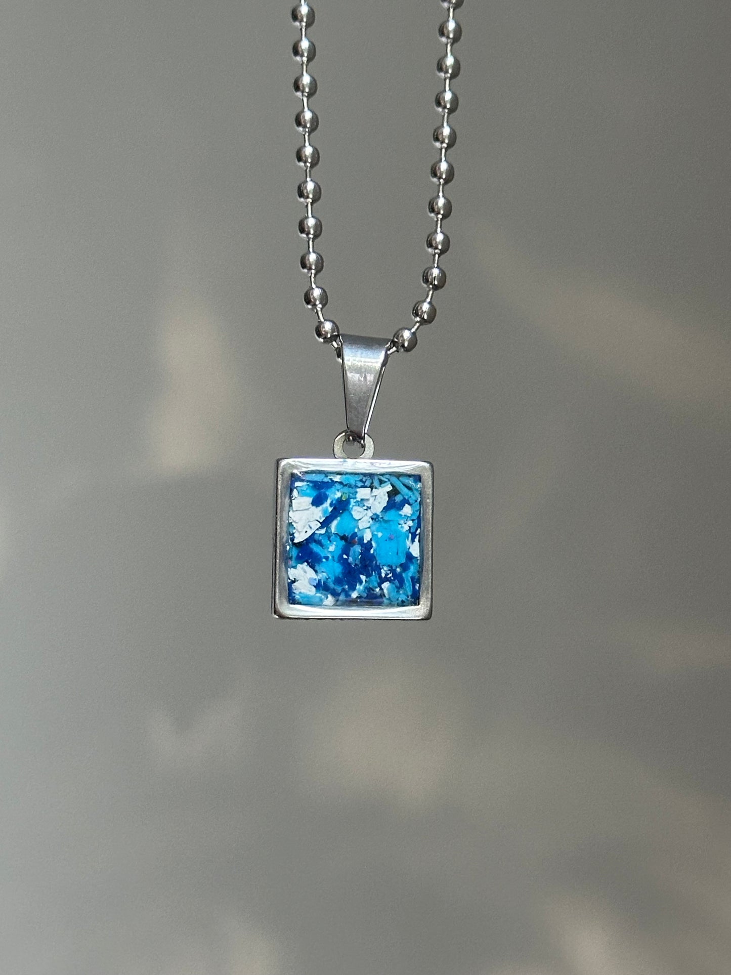 Stainless steel square pendant filled with crayon shavings by crayonfetti. Crayon jewelry.  Crayon gifts. Teacher gift idea.  Crayonpendants.  Crayon pendants.