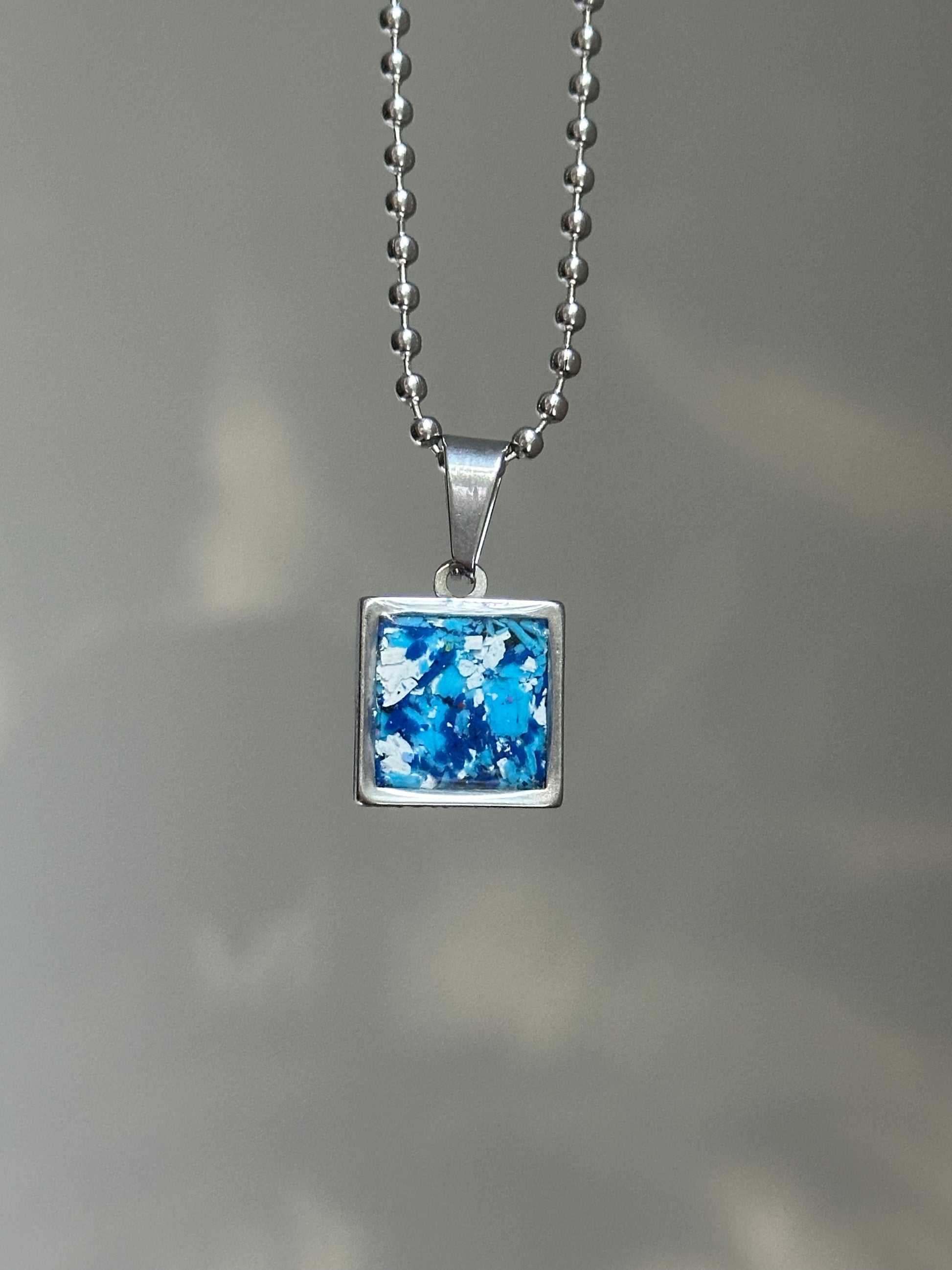 Stainless steel square pendant filled with crayon shavings by crayonfetti. Crayon jewelry.  Crayon gifts. Teacher gift idea.  Crayonpendants.  Crayon pendants.