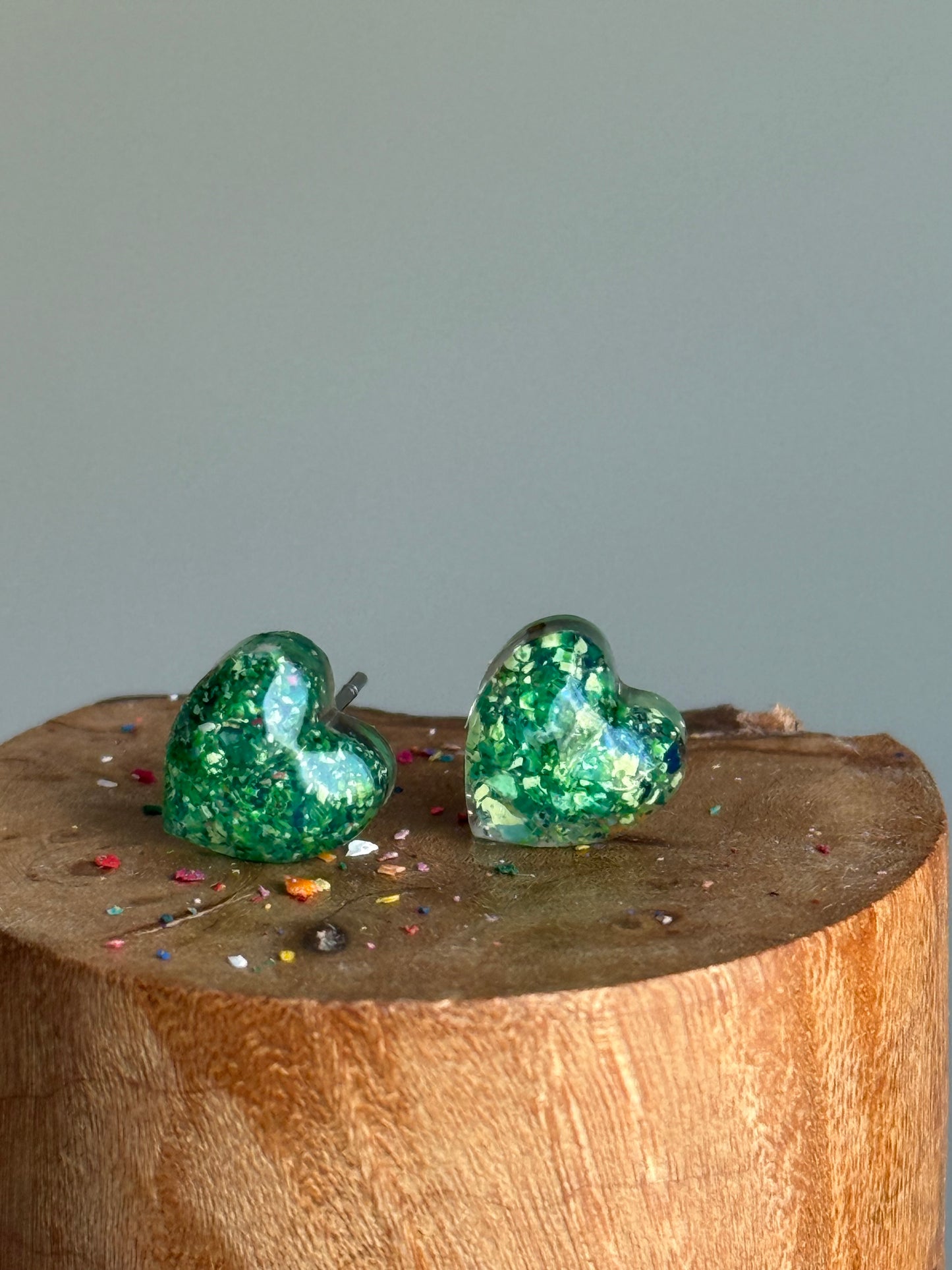small colorful studs made with recycled crayons. Our crayon jewelry are a joyful pop-of-color made from our mother-daughter studio in Atlanta, GA.