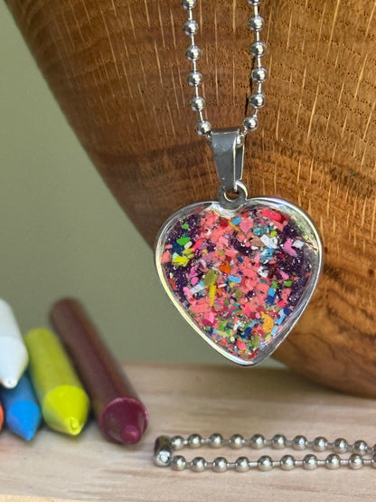 Royal jewel-toned crayon shavings heart necklace handmade statement jewelry. Crayon jewelry by Crayonfetti, mother-daughter based in Atlanta.