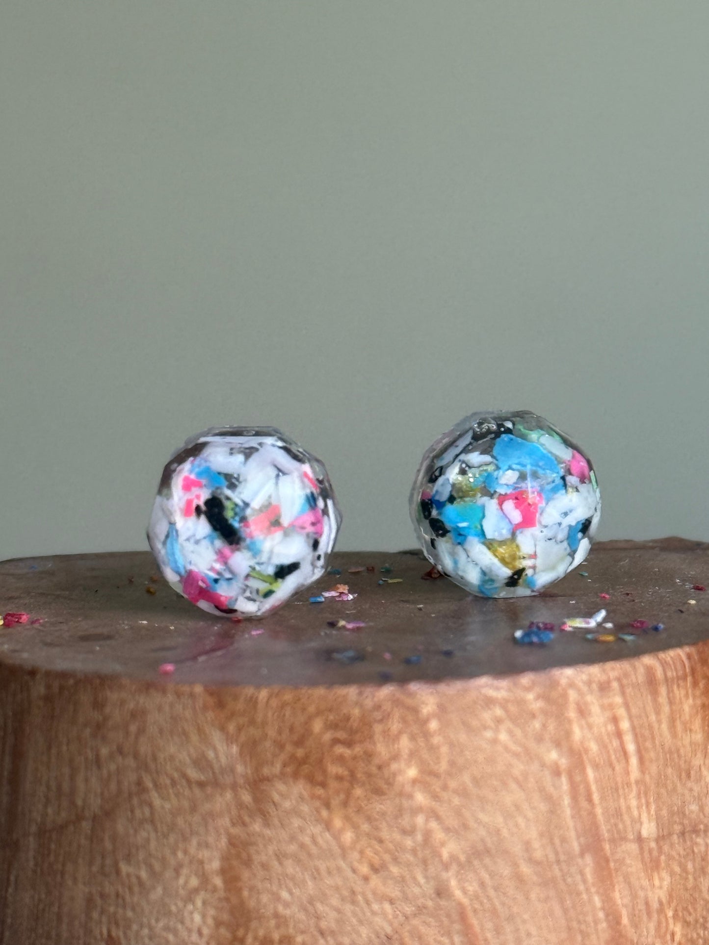 Round studs filled with crayon shavings.  Includes surgical-grade stainless steel posts. Crayonfeti crayon jewelry by mother daughter based in Atlanta. 