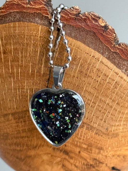 Handmade black heart crayon jewelry necklace with colorful crayon shavings by crayonfetti
