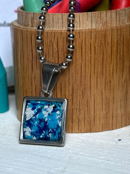 Stainless steel square pendant filled with crayon shavings by crayonfetti. Crayon jewelry.  Crayon gifts. Teacher gift idea.  Crayonpendants.  Crayon pendants.