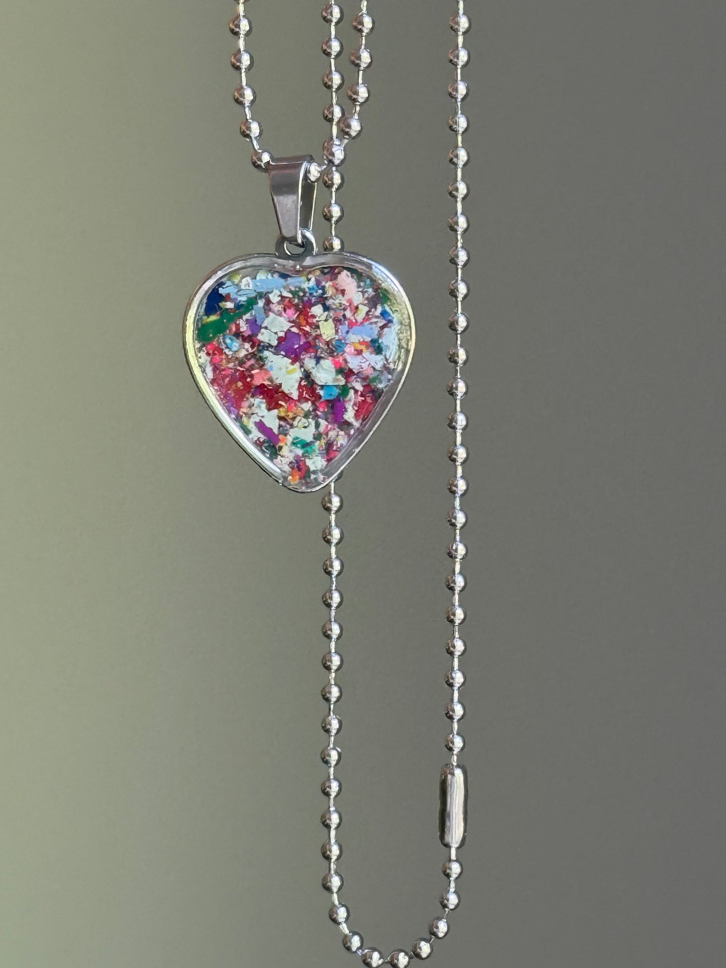  bold crayon shavings heart pendant colorful upcycled necklace. Crayon jewelry by Crayonfetti, mother-daughter based in Atlanta