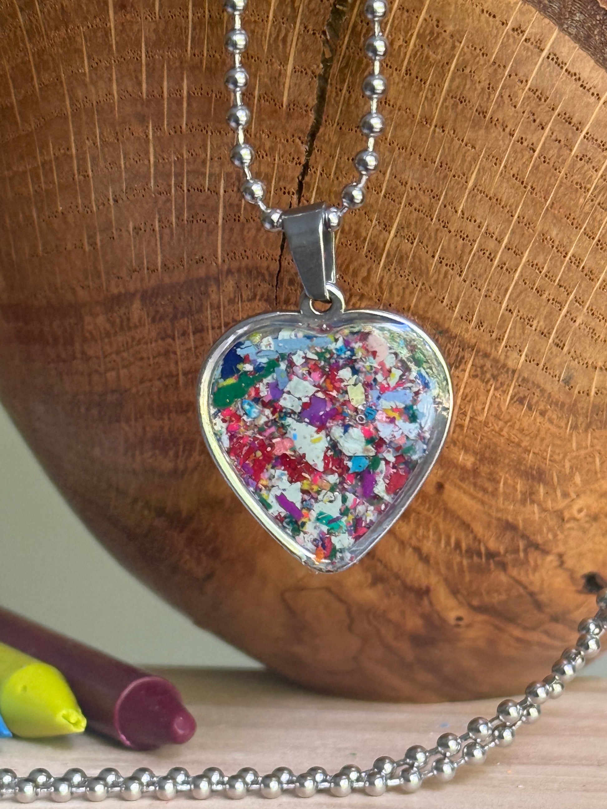 periwinkle blue red heart necklace handmade wearable art upcycled jewelry. Crayon jewelry by Crayonfetti, mother-daughter based in Atlanta.