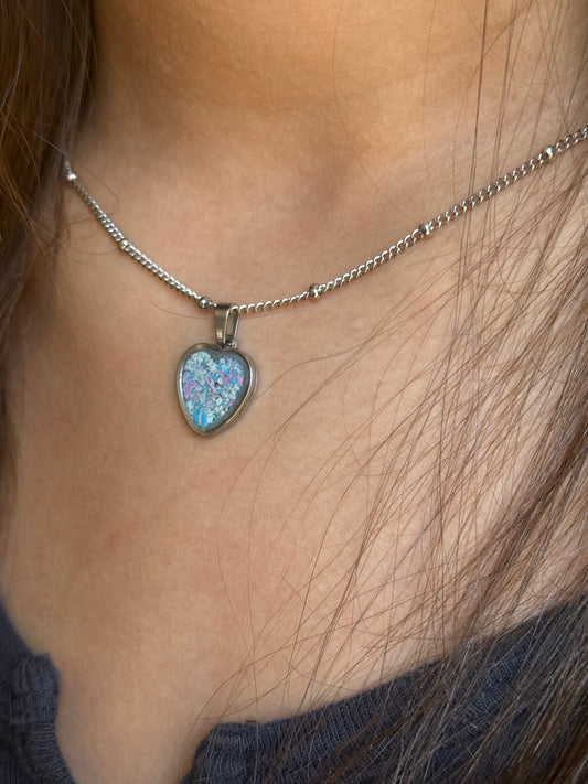 Pink, blush, and rose small heart stainless steel pendant filled with crayon shavings. Dainty necklace. Crayonfetti crayon jewelry by mother-daughter based in Atlanta, Georgia.