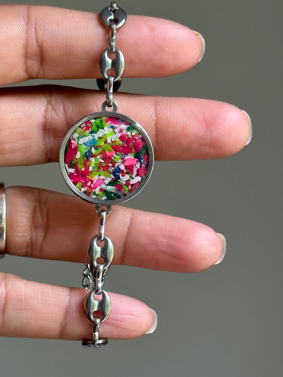 Colorful crayon jewelry in a durable, hypoallergenic stainless steel bracelet.