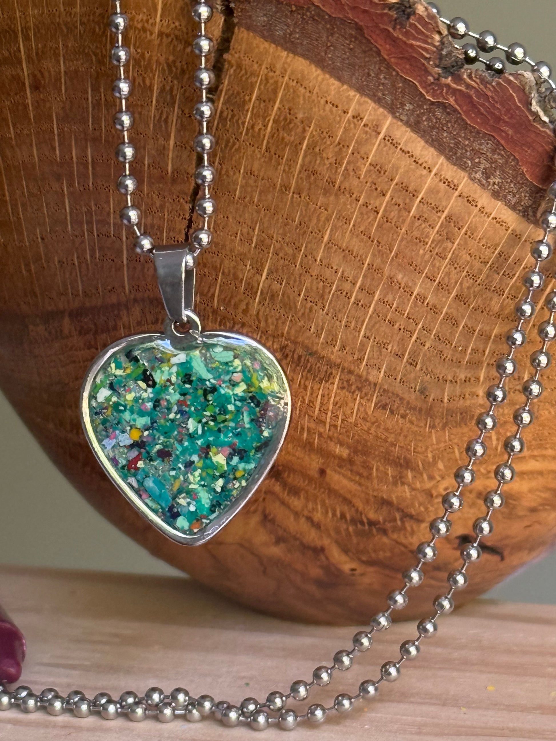 crayon shavings heart necklace handmade wearable art upcycled jewelry. Crayon jewelry by Crayonfetti, mother-daughter based in Atlanta.