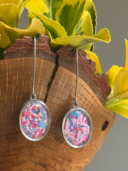 pink earrings made with crayons.